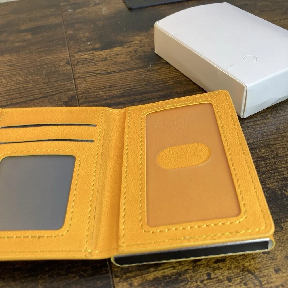Me's Wallet Chrome Yellow Orange Front Pocket Card Pop-Up RFID w Finder Tag Spot